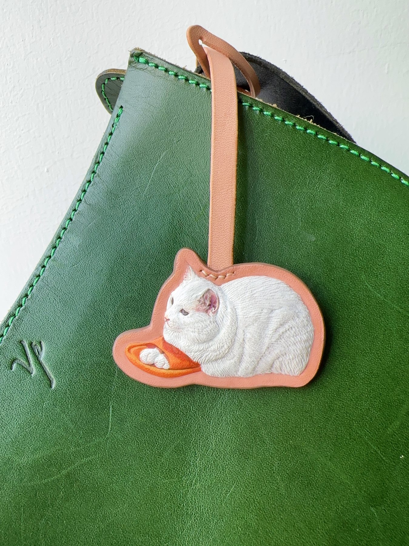 Free-form leather cat portrait